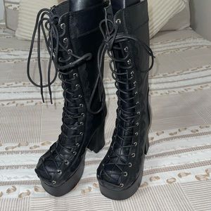 Demonia Deviliana Platform Boots.